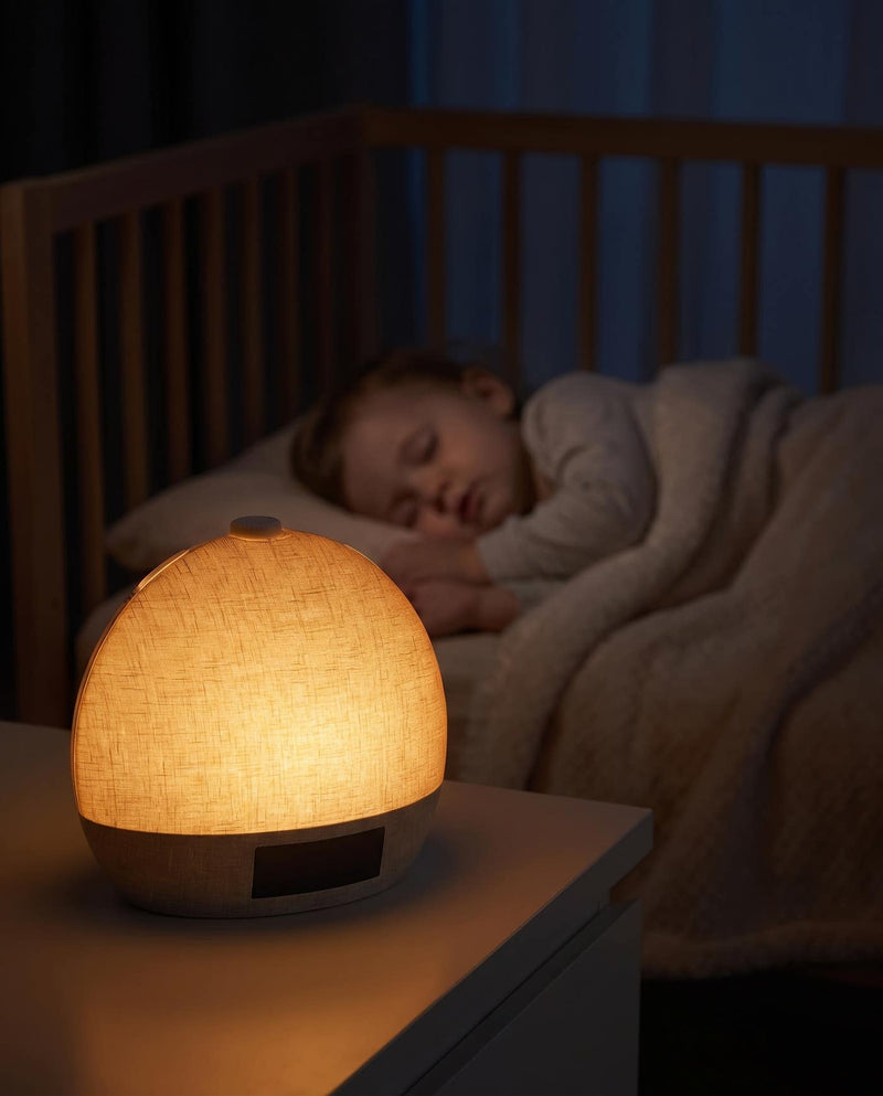 The Easylight glowing as a soft colored night light in a dark room
